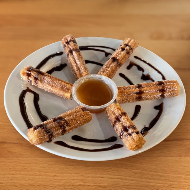 2 Churros with Caramel & Chocolate.